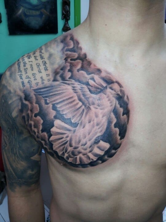 doves and clouds tattoos on chest